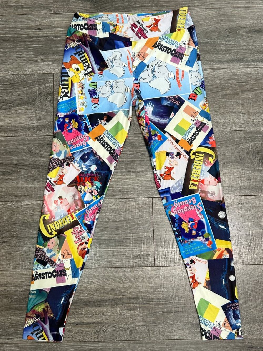 Disney Parks Classic Movie Poster Collage Leggings Medium NWOT
